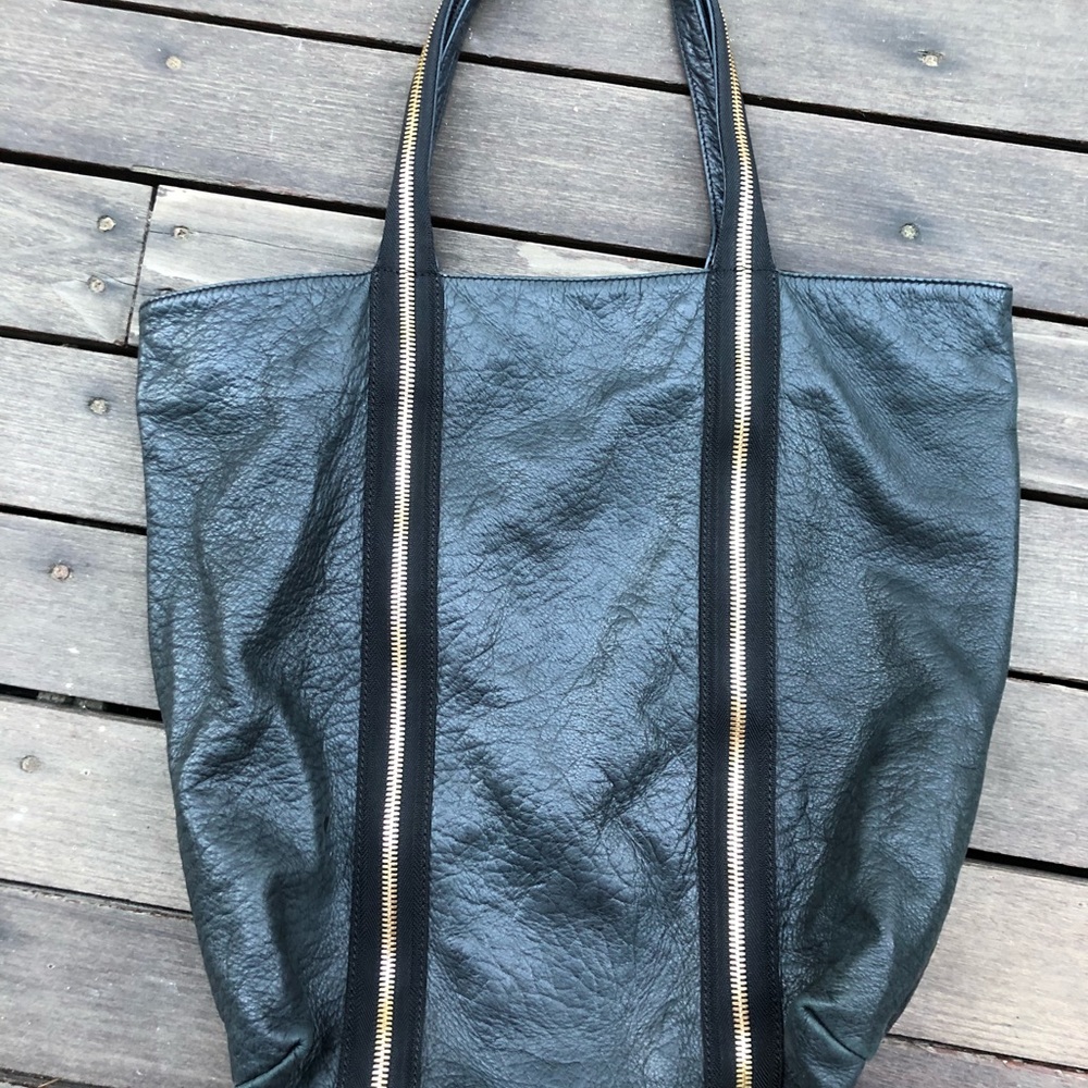 NSEW black leather tote bag with backpack straps
